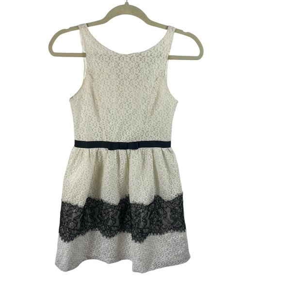 Everleigh Dresses & Skirts - Everleigh Sleeveless Cream Lace Dress with Black Lace Accents, XS